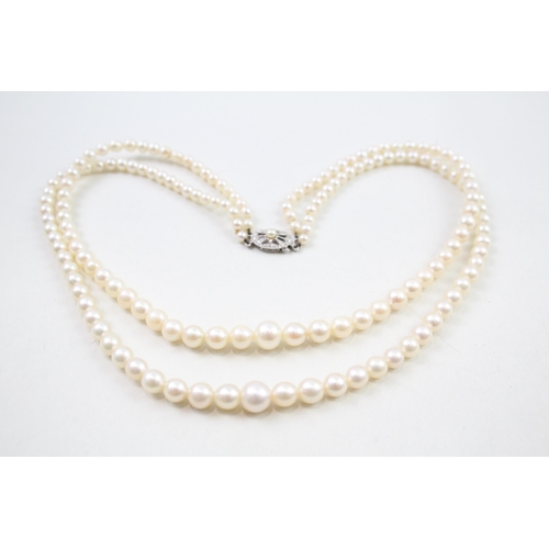 110 - 9ct gold cultured pearl two row necklace (39g)