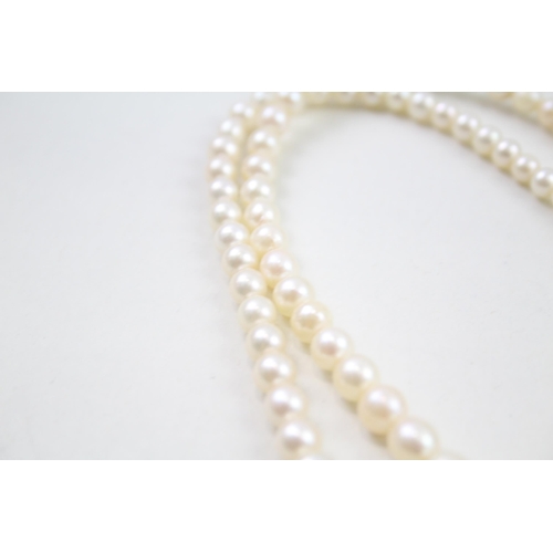 110 - 9ct gold cultured pearl two row necklace (39g)