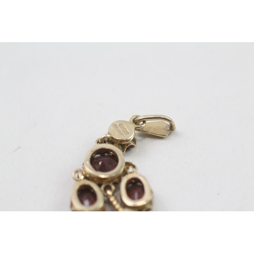 113 - 9ct garnet drop pendant (4.3g)