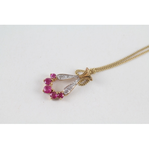 122 - 9ct gold ruby & diamond pendant & chain (2.7g)