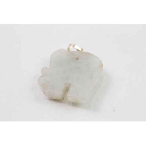 26 - 2x 9ct gold jade elephant & heart shaped pendants (11.4g)