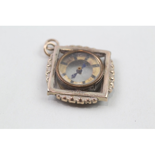 60 - 9ct gold compass pendant (4.8g)