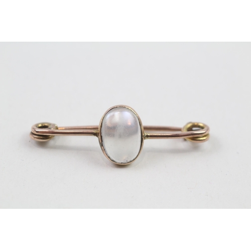 63 - 9ct gold moonstone bar brooch (2.5g)