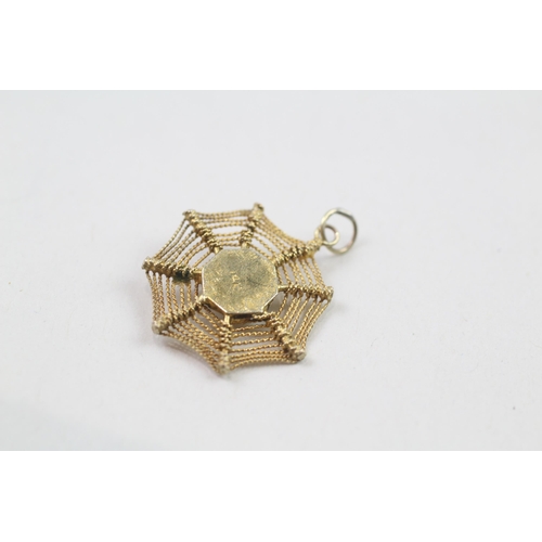 64 - 12ct gold spider pendant (1.2g)