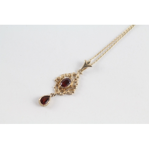 67 - 9ct gold garnet drop pendant & chain (3.5g)