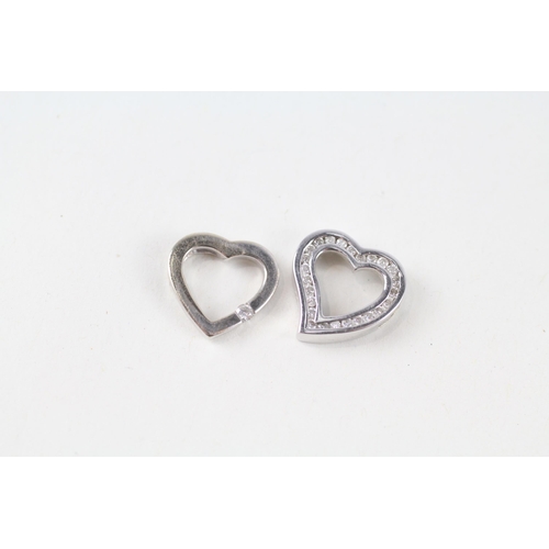2x 9ct white gold diamond heart shaped pendants (2.8g)
