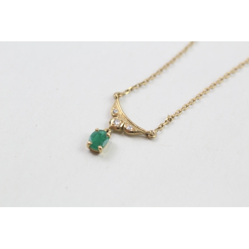 73 - 9ct gold emerald & diamond necklace (3.1g)