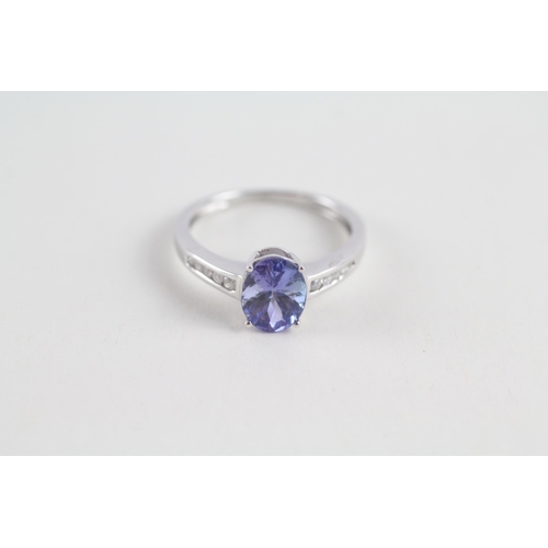 90 - 9ct gold tanzanite & diamond ring (2.1g) Size  N 1/2