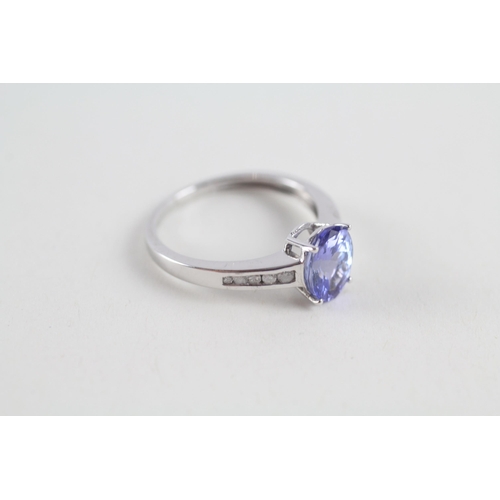 90 - 9ct gold tanzanite & diamond ring (2.1g) Size  N 1/2