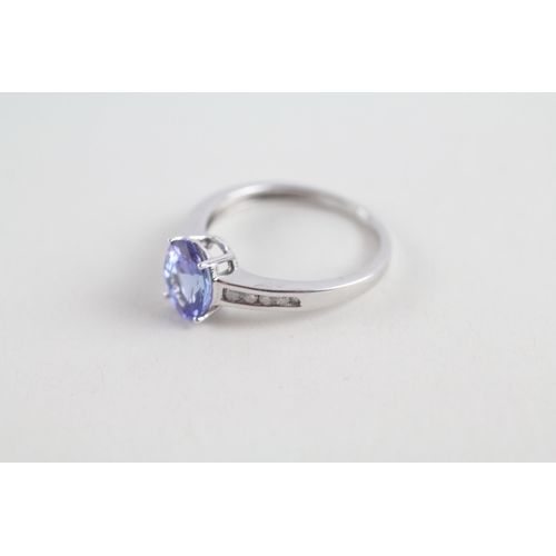 90 - 9ct gold tanzanite & diamond ring (2.1g) Size  N 1/2