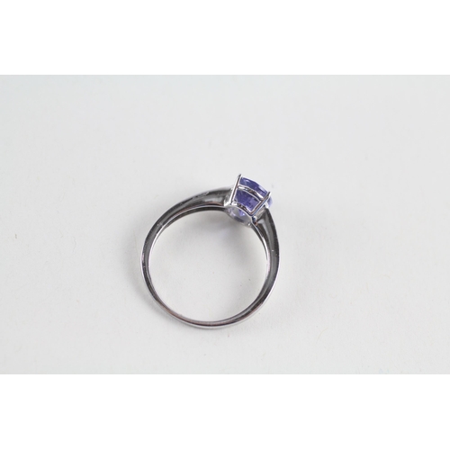 90 - 9ct gold tanzanite & diamond ring (2.1g) Size  N 1/2