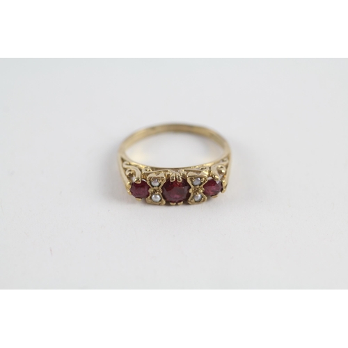 93 - 9ct gold ruby & seed pearl ring (3g) Size  K