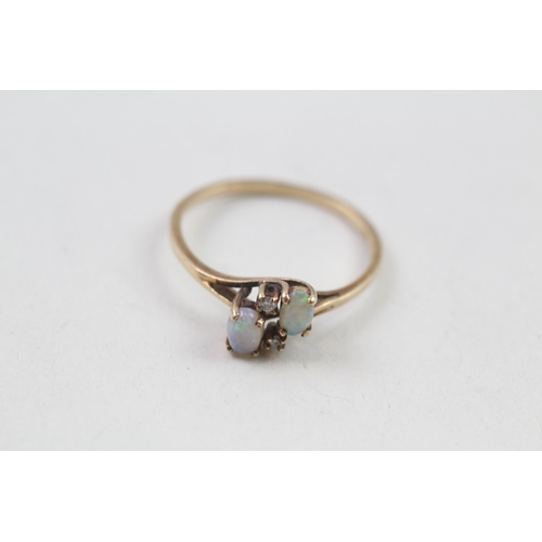 117 - 10ct gold diamond & opal dress ring (1.3g) Size  O 1/2