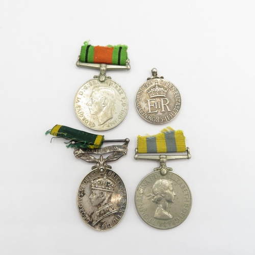 A selection of medals to CPL WH Gascoyne of the Foresters 4 medals in total.  Korea Medal inscription 22267858 SGT W Gascoyne RNF.  Efficiency Medal inscription 4976315 Cpl W H Gascoyne Foresters.