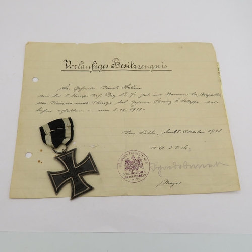 A German iron cross with paperwork