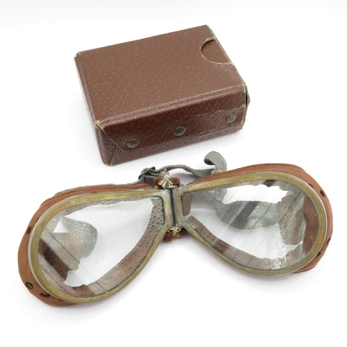 A pair of leather bound flying glasses