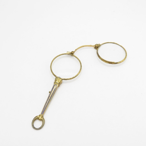 a brass and enamel guilded lorgnette