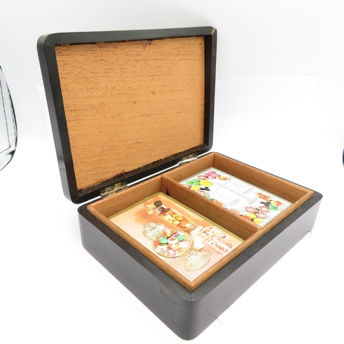 An antique ebony box with silver inlay containing packs of cards box measures 160mm x 120mm