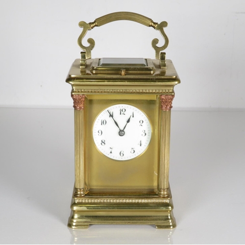 A large chiming carriage clock 150mm x 100m.  Clock requires full service