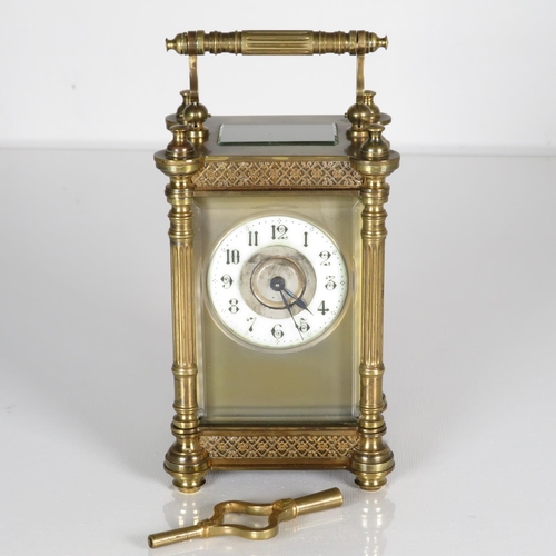 A midsize carriage clock 110mm x 70mm.  Clock runs