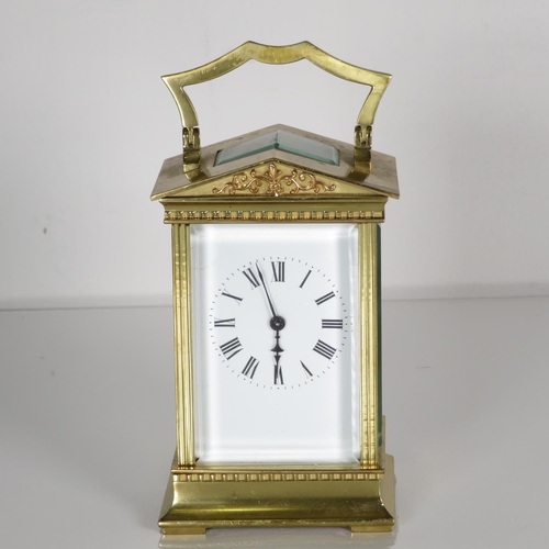 A midsize carriage clock 130mm x 70mm.  Fully running