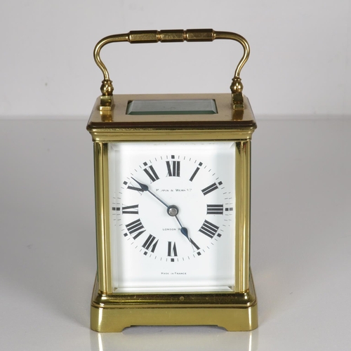 A  midsize French movement carriage clock.  Clock runs.  120mm x 80mm
