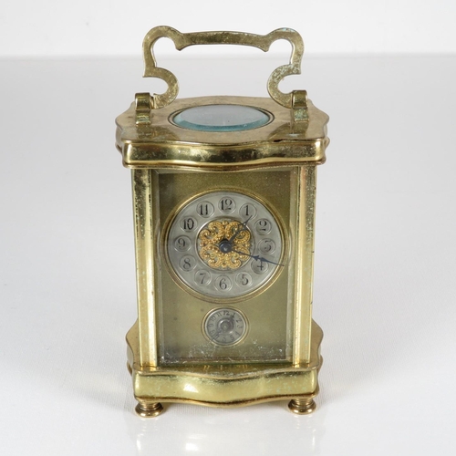 A French carriage clock with underbell.  Clock is overwound and requires full service.  120mm x 80mm