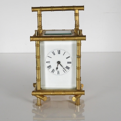 A large chiming carriage clock with French movement and bamboo design.  Clock requires full service.  160mm x 110mm