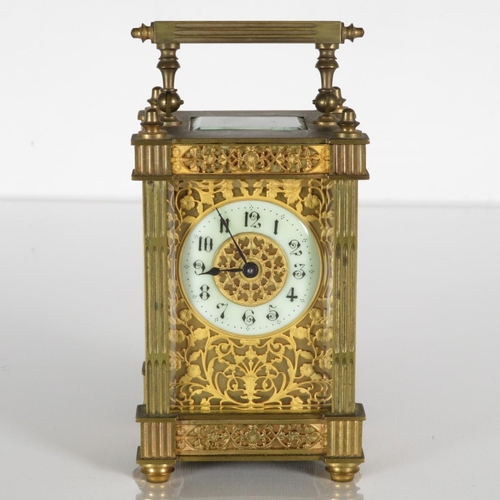 A Filigree brass midsized carriage clock.  Clock is running.  130mm x 80mm