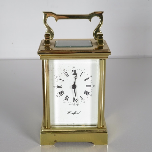 A Woodford midsized chiming carriage clock with 13 unadjusted jewel.  120mm x 80mm.  Fully running