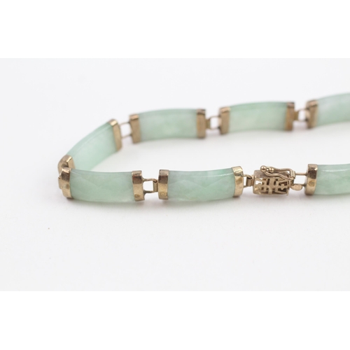 108 - 9ct gold faceted jade bracelet (10.2g)