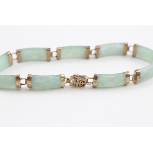 108 - 9ct gold faceted jade bracelet (10.2g)