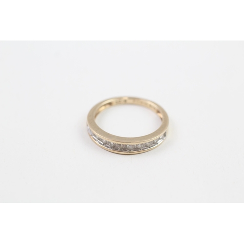 109 - 9ct gold channel set diamond half eternity ring (2.2g) Size  N