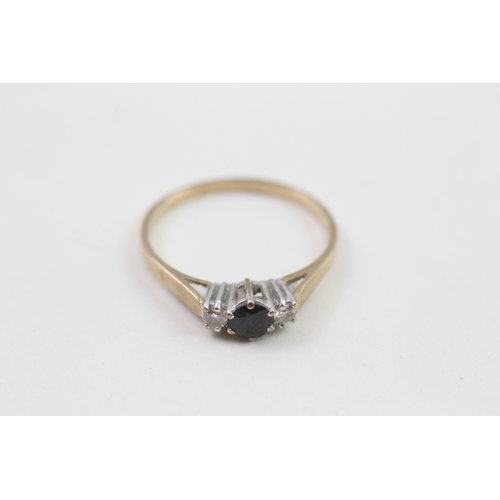 121 - 9ct gold diamond & sapphire three stone ring (1.7g) Size  Q