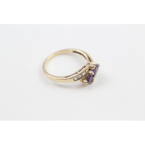 129 - 9ct gold amethyst two stone bypass ring with white gemstone set shank (2g) Size  N 1/2