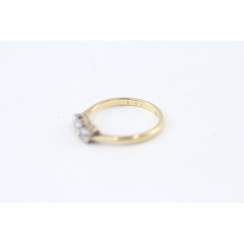 132 - 18ct gold old cut diamond three stone ring (1.9g) Size  K