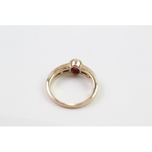 140 - 9ct gold bezel set ruby single stone ring with diamond set shank (2.5g) Size  T 1/2