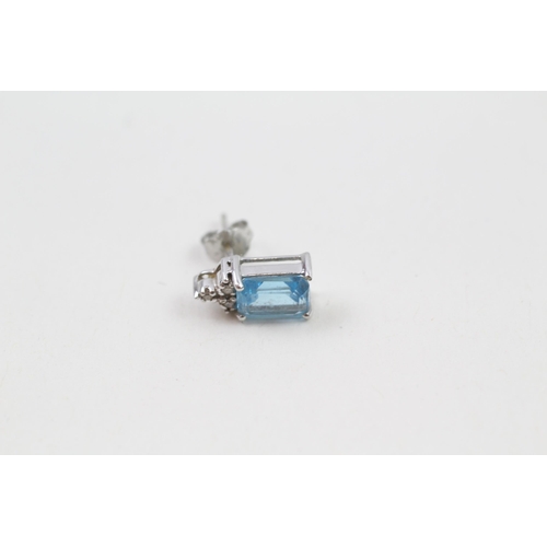 142 - 9ct white gold diamond & topaz stud earrings (1.8g)