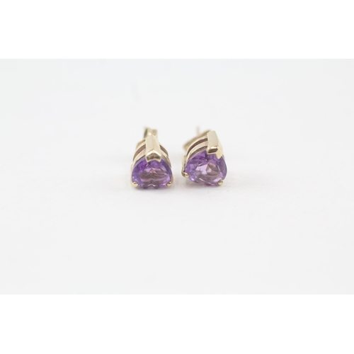 159 - 2 x 9ct gold amethyst stud earrings (3.3g)