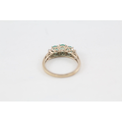 171 - 9ct gold emerald three stone ring with diamond sides (1.8g) Size  N 1/2