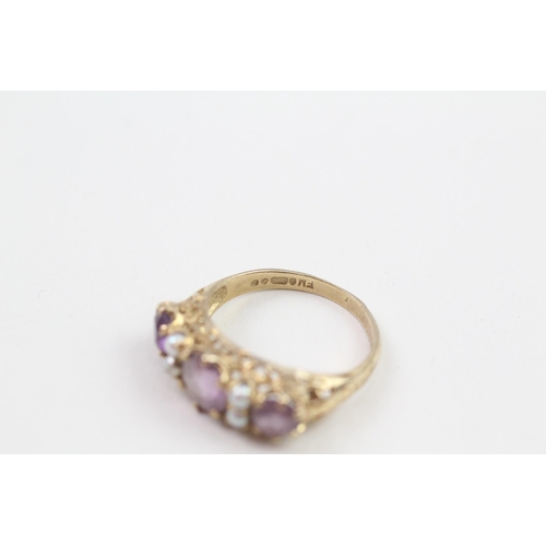 172 - 9ct gold amethyst & seed pearl seven stone ring (2.8g) Size  P