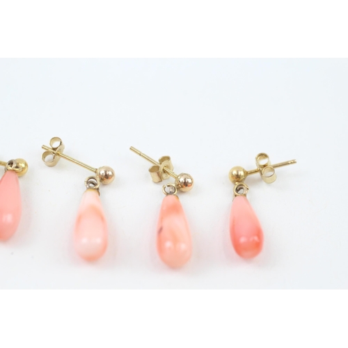 36 - 2x 9ct gold polished coral drop earrings with scroll backs (2.6g)