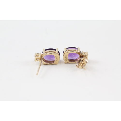 45 - 14ct gold diamond & amethyst stud earrings (2g)