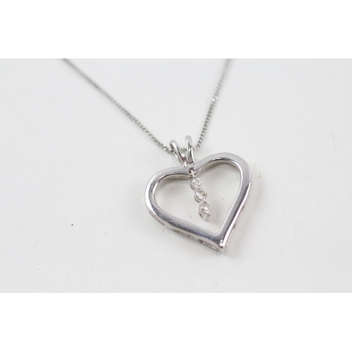 62 - 9ct white gold diamond heart pendant necklace (1.7g)