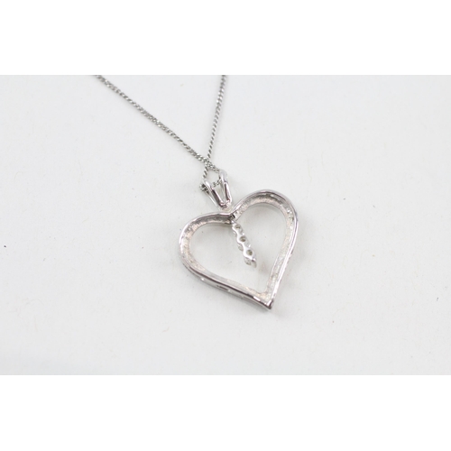 62 - 9ct white gold diamond heart pendant necklace (1.7g)