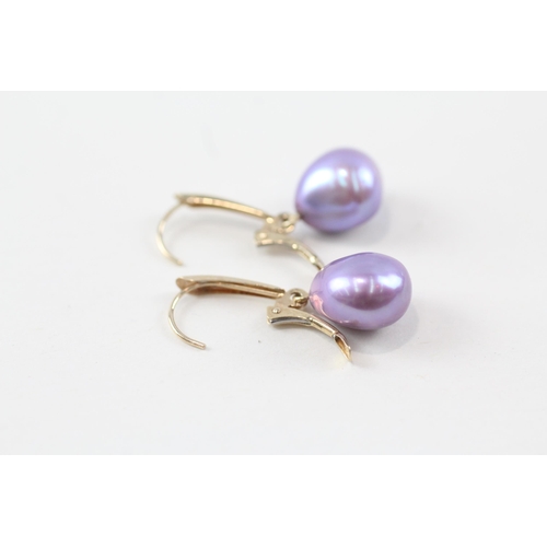 63 - 14ct gold baroque pearl drop earrings (3.8g)