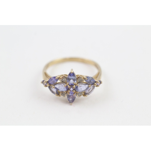 78 - 9ct gold diamond & tanzanite floral cluster ring (2.1g) Size  P