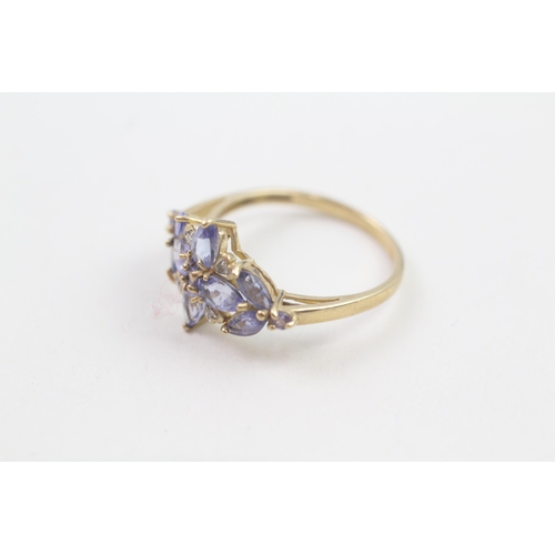 78 - 9ct gold diamond & tanzanite floral cluster ring (2.1g) Size  P