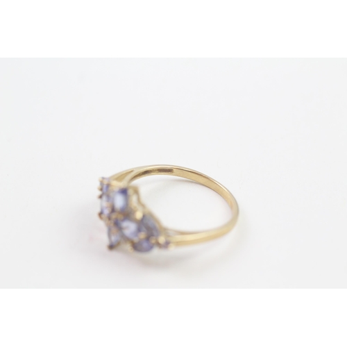 78 - 9ct gold diamond & tanzanite floral cluster ring (2.1g) Size  P