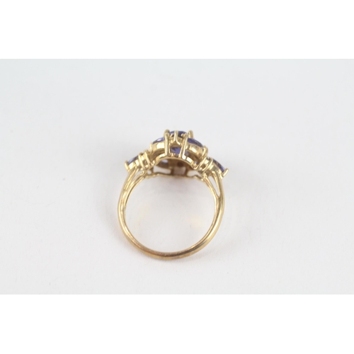 79 - 9ct gold iolite cluster ring (3.4g) Size  N 1/2